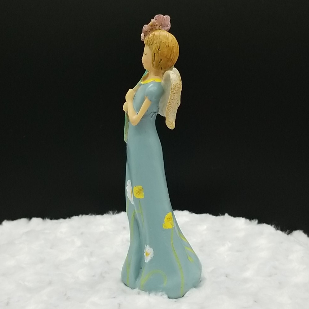 Angel in Blue Dress with Flowers Holding a Pink Daisy Figurine - Picture 2 of 6